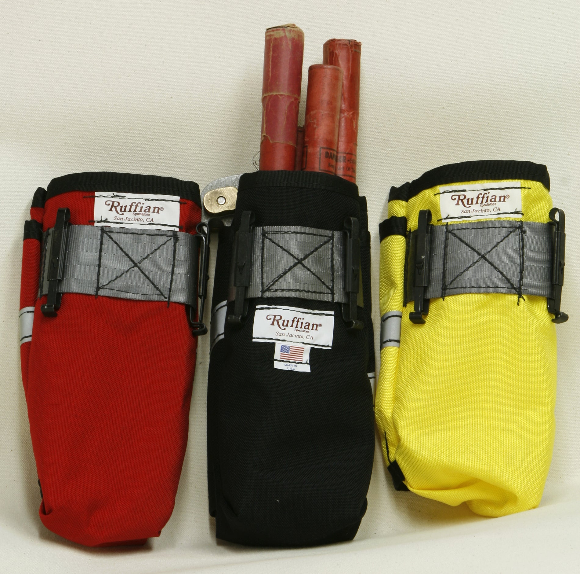 40-01-0042 Ruffian Specialties Fuese Pack Small with Hose Clamp Sleeve Black Red Yellow Back View.jpg
