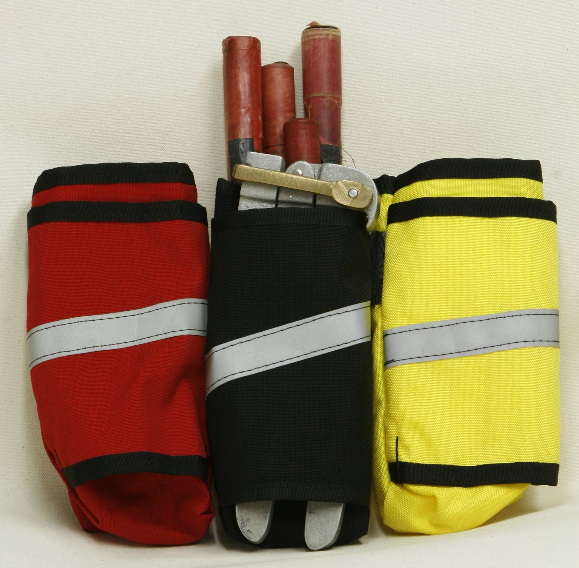 40-01-0042 Ruffian Specialties Fuese Pack Small with Hose Clamp Sleeve Black Red Yellow Front View.jpg