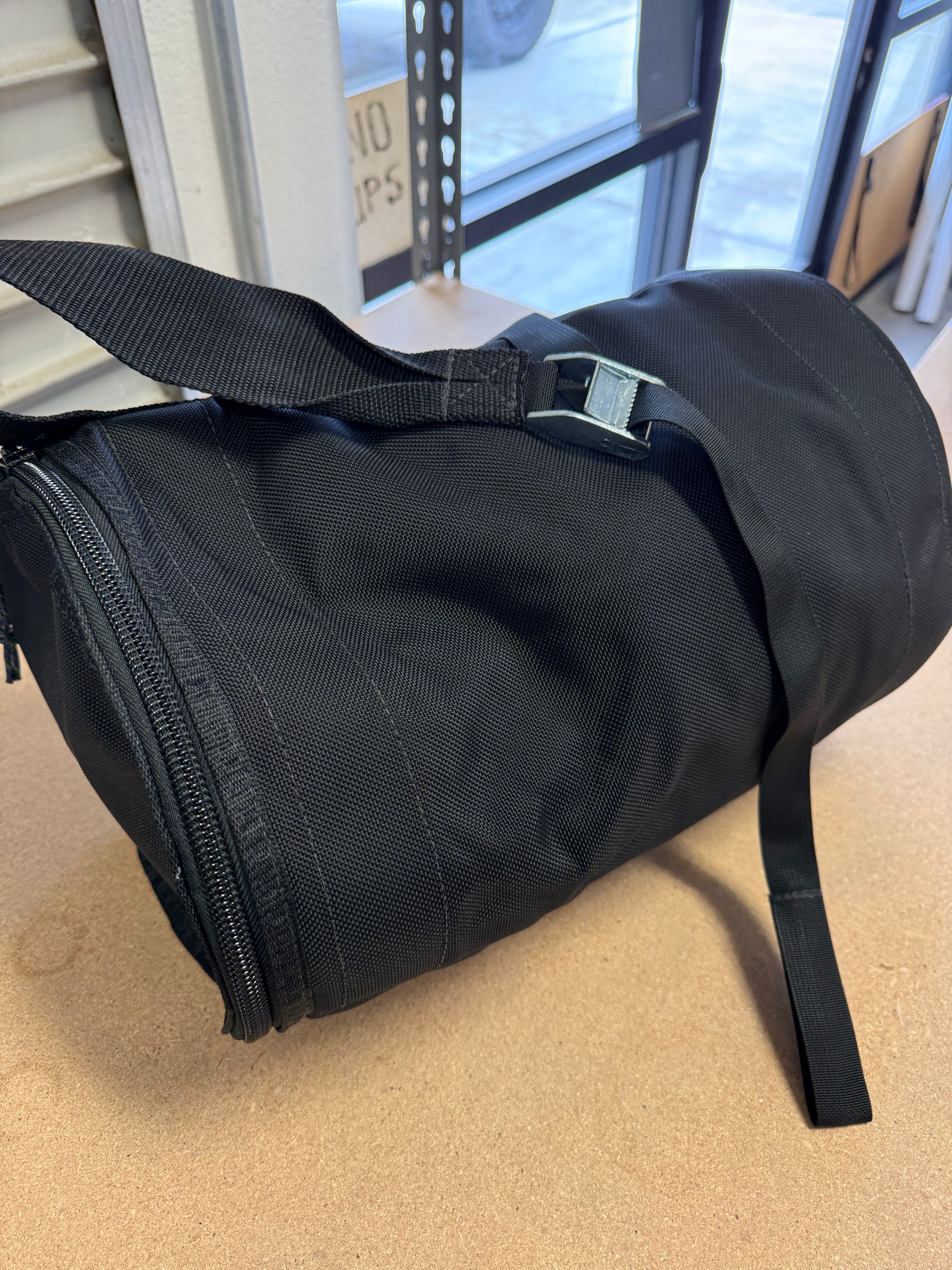 Yard sale round ballistic bag small single strap